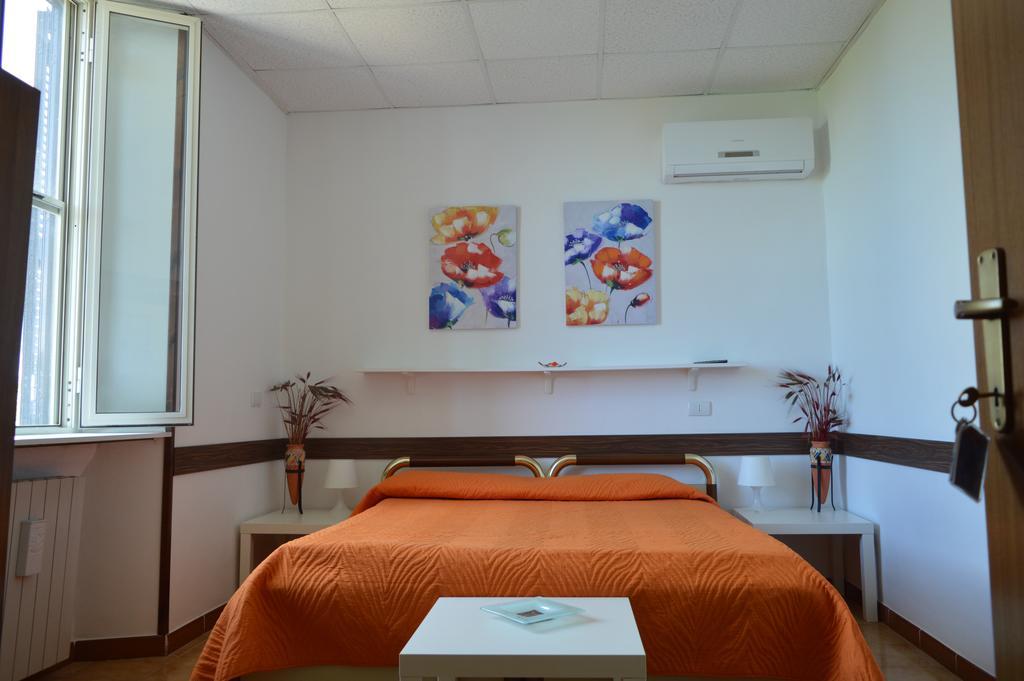 Albergo Ollolai ชิวิตาเวกเกีย ภายนอก รูปภาพ